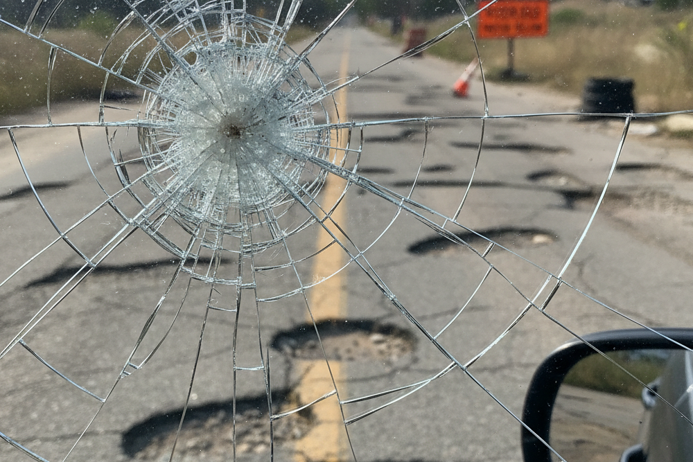 How Shattered Windshields Hint at Road Problems